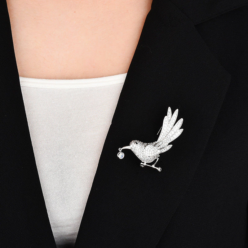Bird brooch